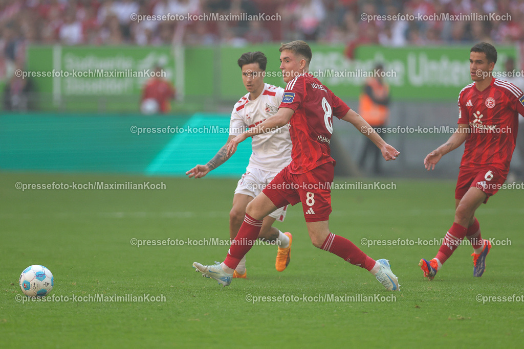 Due21092402171 | 21.09.2024, 2. Fußball Bundesliga, Fortuna Düsseldorf - 1. FC Köln, Merkur Spiel-Arena, Saison 2024 2025: Denis Huseinbasic (1.FC Köln #8) Isak Johannesson (Fortuna Düsseldorf #8)DFB regulations prohibit any use of photographs as image sequences and or quasi-video.