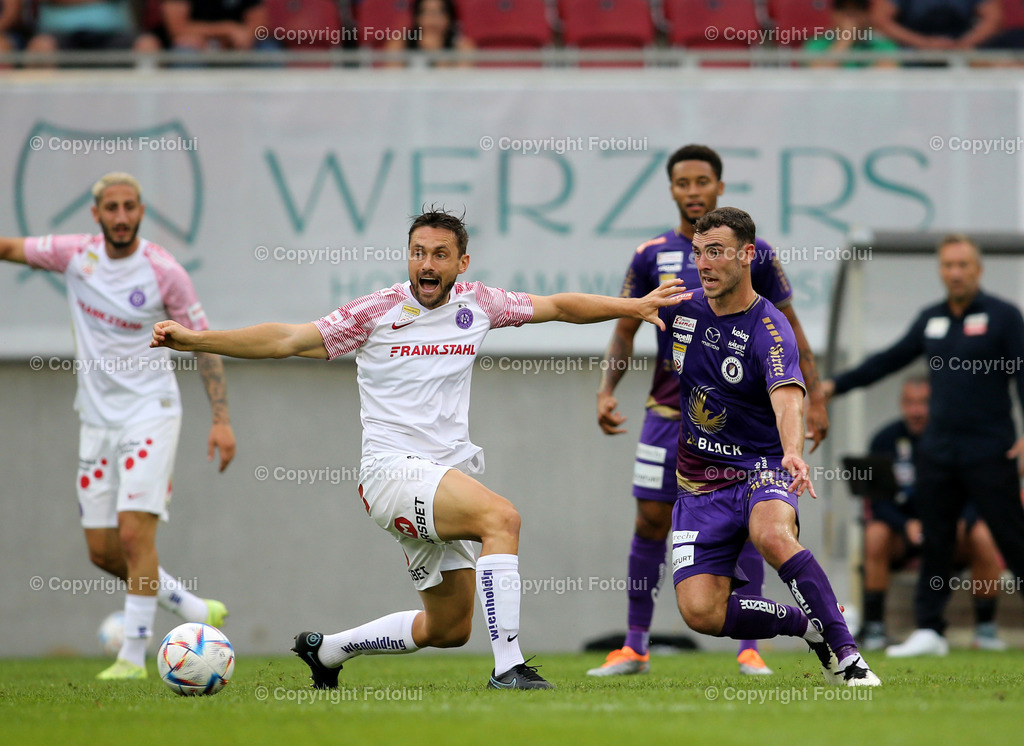 A_LUI_280822_11 | SPORT,FUSSBALL,ADMIRAL BUNDESLIGA AUSTRIA KLAGENFURT-AUSTRIA WIEN  28.08.2022 IM BILD: JAMES HOLLAND (WIEN ) UND ANDREW IRVING (KLAGENFURT) FOTO: FOTOLUI/MARIO WIMMER