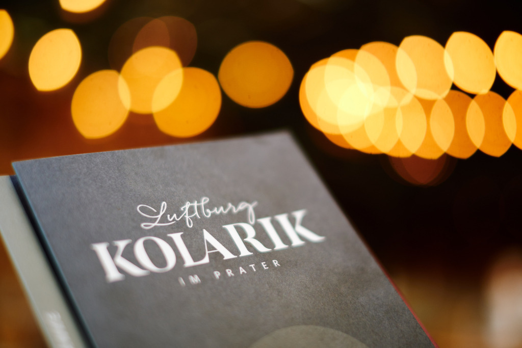 Luftburg Kolarik, eine Speisekarte mit Logo | WIen, Austria - February 24, 2022; Luftburg Kolarik, eine Speisekarte mit Logo. - Realisiert mit Pictrs.com