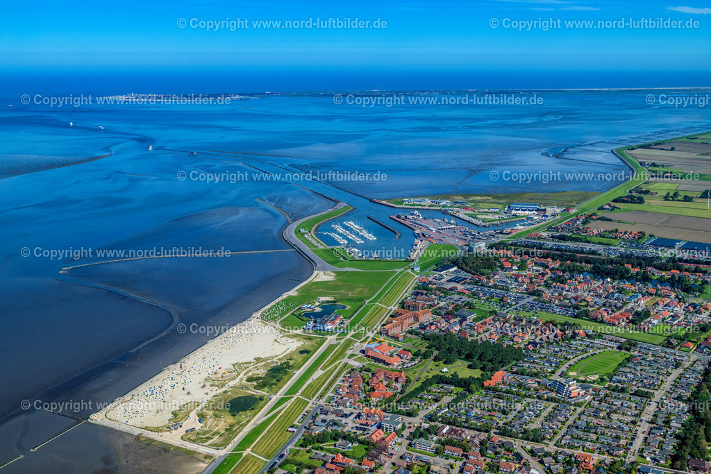 Norddeich_Hafen_ELS_7126050923 | NORDEN 05.09.2023 Hafengebiet" Norddeich Mole " in Norden Nordeich im Bundesland Niedersachsen, Deutschland. Weiterführende Informationen bei: Albert Fischer GmbH,  DB Netz AG,  Deutsche Bahn AG,  Niedersachsen Ports GmbH & Co. KG,  Reederei Norden-Frisia AG. // Port area "Norddeich Mole" in Norden Nordeich in the state Lower Saxony, German. Further information at: Albert Fischer GmbH,  DB Netz AG,  Deutsche Bahn AG,  Niedersachsen Ports GmbH & Co. KG,  Reederei Norden-Frisia AG. Foto: Martin Elsen