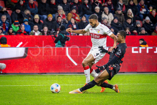German Bundesliga, Bayer 04 Leverkusen vs. VfB Stuttgart, 10.01.2026 | LEVERKUSEN, GERMANY - JANUARY 10:  Jeanuel Belocian (Bayer 04 Leverkusen, 44) fouls Josha Vagnoman (VfB Stuttgart,4), a penalty was the result during the German Bundesliga match on gameday 16 between Bayer 04 Leverkusen vs. VfB Stuttgart at BayArena on January 10, 2026 in Leverkusen, Germany. DFL REGULATIONS PROHIBIT ANY USE OF PHOTOGRAPHS AS IMAGE SEQUENCES AND/OR QUASI-VIDEO.