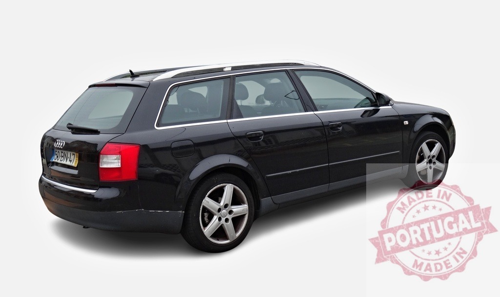 Black Audi A4 Avant parked on white background | Rear view of a black Audi A4 Avant station wagon showcasing its design and features - Realisiert mit Pictrs.com