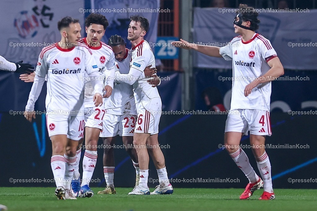 BOC20022601043 | 20.02.2026, Fußball, VfL Bochum - 1. FC Nürnberg, 2. Fußball Bundesliga, 23. Spieltag, Vonovia Ruhrstadion, Saison 2025 2026: Torjubel nach dem Tor zum 1:0 durch Torschütze Mohamed Alì Zoma&nbsp;(1FC Nuernberg #23) zusammen mit Adam Markhiev&nbsp;(1FC Nuernberg #06)   DFB regulations prohibit any use of photographs as image sequences and or quasi-video.