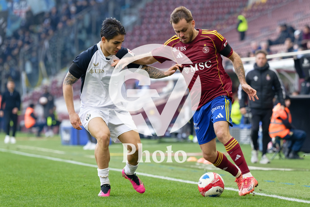 Brack Super League - Servette FC v FC Zurich | Timothe Cognat (8 Servette FC) in action (close up) under pressure of Miguel Reichmuth (38 FC Zurich)  during the Brack Super League match between Servette FC and FC Zurich at Stade de Geneve in Geneva, Switzerland