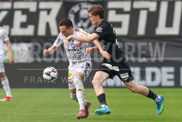 SK Puntigamer Sturm Graz vs TSV Egger Glas Hartberg – Championship Group    | Graz, Austria, 12.Apr.26 - SOCCER - ADMIRAL Bundesliga, SK Puntigamer Sturm Graz vs TSV Egger Glas Hartberg. The image shows Lukas Fridrikas (Hartberg) and Luca Weinhandl (STU).    