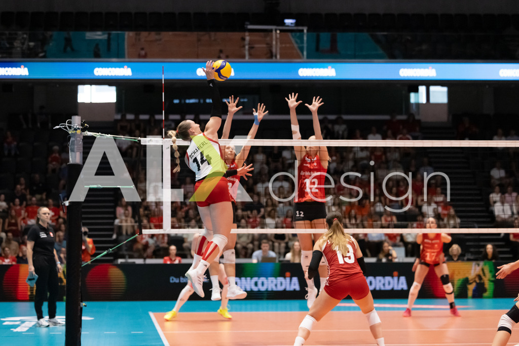 Austria v Switzerland - CEV European League Women | KRIENS, SWITZERLAND - JUNE 14: KORA MARINA SCHABERL of Austria attack / spike against FABIANA BRANCA of Switzerland and MÉLINE PIERRET of Switzerland during the CEV European League match between Austria and Switzerland at Pilatus Arena on June 14, 2026 in Kriens, Switzerland. - Realisiert mit Pictrs.com