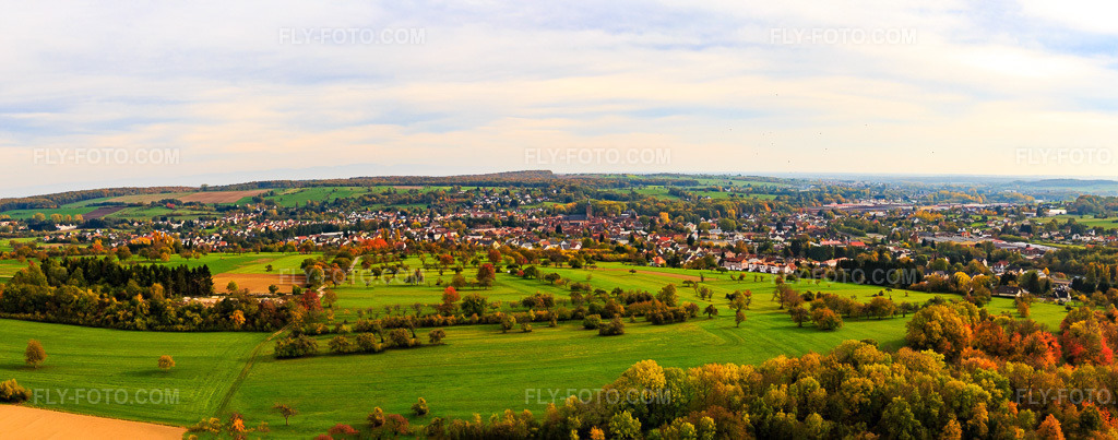 Aerial view: Panoramas behind orchards from the west in Niederbronn-les-Bains in the state Bas-Rhin, France. – Photo: IMG_084742-Pano.jpg taken on 10/24/2015 by Werner Riehm/FLY-FOTO.com – Resolution of the original: 9568 x 3765 px