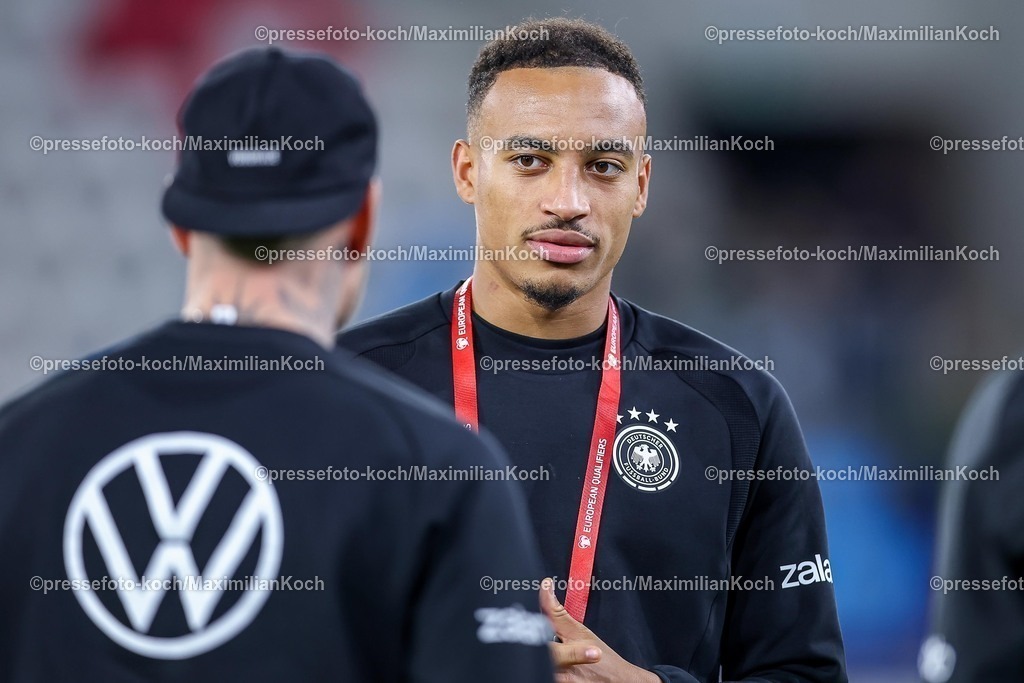 DFB14112501015 | 14.11.2025, Fußball, Länderspiel, WM-Qualifikation Europa, Deutschland - Luxemburg, Stade de Luxembourg (Croix de Gasperich, Luxemburg), 9. Spieltag, Saison 2025 2026: Malick Thiaw (GER)  bei der Platzbehung vor dem SpielRegulations prohibit any use of photographs as image sequences and or quasi-video.