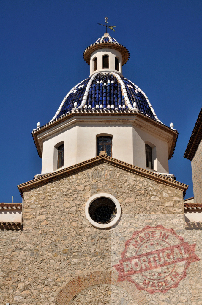 Altea church blue dome under clear sky | Mediterranean church featuring a beautiful blue tiled dome against a bright blue sky - Realized with Pictrs.com