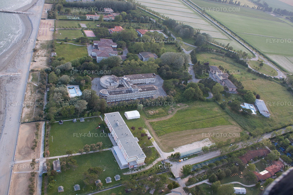 Aerial view: A dilapidated former family holiday home, ex Colonia La Nostra Famiglia, on the Adriatic coast in Duna Verde in the state Veneto, Italy.Photo: IMG_50294.jpg taken on 06/07/2012 by Werner Riehm/FLY-FOTO.comResolution of the original: 4752 x 3168 px