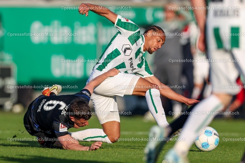 SCP09052501074 | 09.05.2025, Fußball, Preußen Münster - Hertha BSC, 2. Fußball Bundesliga, 33. Spieltag, Preußenstadion, Saison 2024 2025: Diego Demme (Hertha BSC #06) im Zweikampf gegen Etienne Amenyido (Preussen Muenster #30) DFB regulations prohibit any use of photographs as image sequences and or quasi-video.