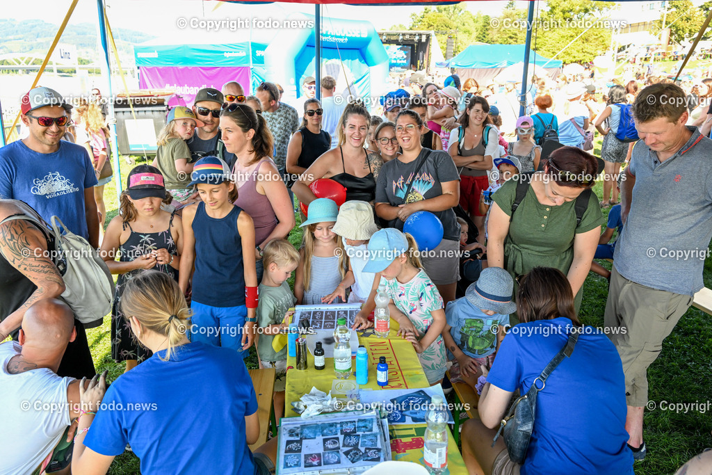 Kinderklangwolke Linz 2023_ 10.09.2023-9 | 10.09.2023, Donaulaende Linz, AUT, Kinderklangwolke 2023, im Bild Kinderklangwolke, Buehne, Zuschauer