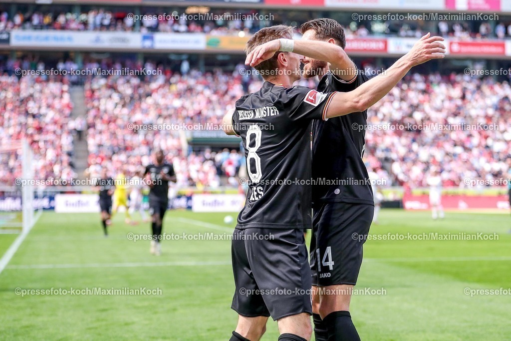1FC20042501079 | 20.04.2025, Fußball, 1. FC Köln - Preußen Münster, 2.. Fußball Bundesliga, 30. Spieltag, RheinEnergie-STADION, Saison 2024 2025: Torjubel Joshua Mees (Preussen Muenster #08) zusammen mit Charalambos Makridis (Preussen Muenster #14) nach dem Eigentor zum 1:1 durch Timo Hübers (FC Koeln #4) DFB regulations prohibit any use of photographs as image sequences and or quasi-video.