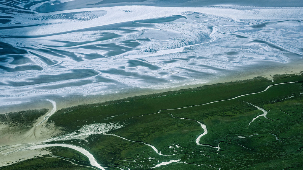 dr__0013108.jpg | SANKT PETER-ORDING 07.08.2017 Wattenmeer der Nordsee- Küste in Sankt Peter-Ording im Bundesland Schleswig-Holstein, Deutschland. // Wadden Sea of North Sea Coast in Sankt Peter-Ording in the state Schleswig-Holstein, Germany. Foto: Daniel Reiter