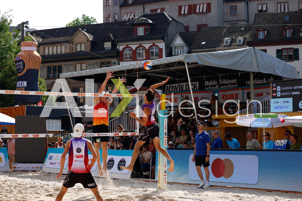 Obi BeachTour 2026 - Basel | BASEL, SWITZERLAND - JULY 17: MAËL MASSEREY (SUI) attack / spike against LAURENZ LEITNER (AUT) during the Obi BeachTour 2026 match between LEITNER / KINDL (AUT) and MASSEREY / SCHNEGG (SUI) at Barfüsserplatz on July 17, 2026 in Basel, Switzerland. - Realisiert mit Pictrs.com