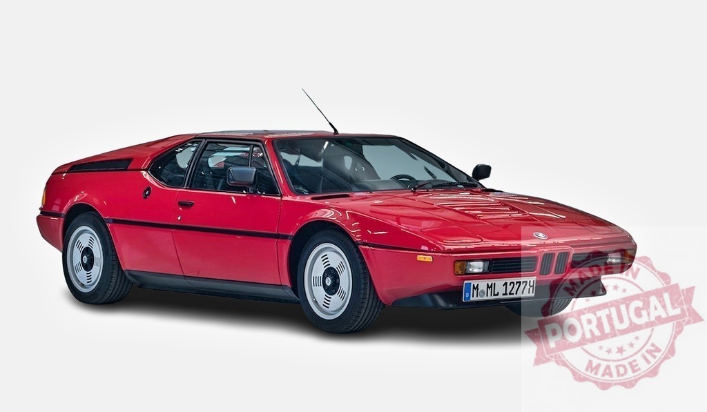 Red BMW M1 supercar standing out against white background | Classic red BMW M1 supercar parked against a white background, showcasing its iconic design and sporty features - Realized with Pictrs.com