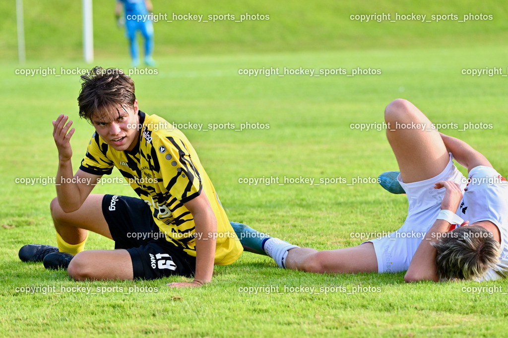 FC Faakersee vs. Rapid Lienz  | #19 Felix Maximilian Opriessnig FC Faakersee, #16 Sandro Unterreiner Rapid Lienz, FC Faakersee vs. Rapid Lienz , FC Faakersee vs. Rapid Lienz  am 04.08.2024 in Faakersee (Sportplatz Faakersee), Austria, (Photo by Bernd Stefan)
