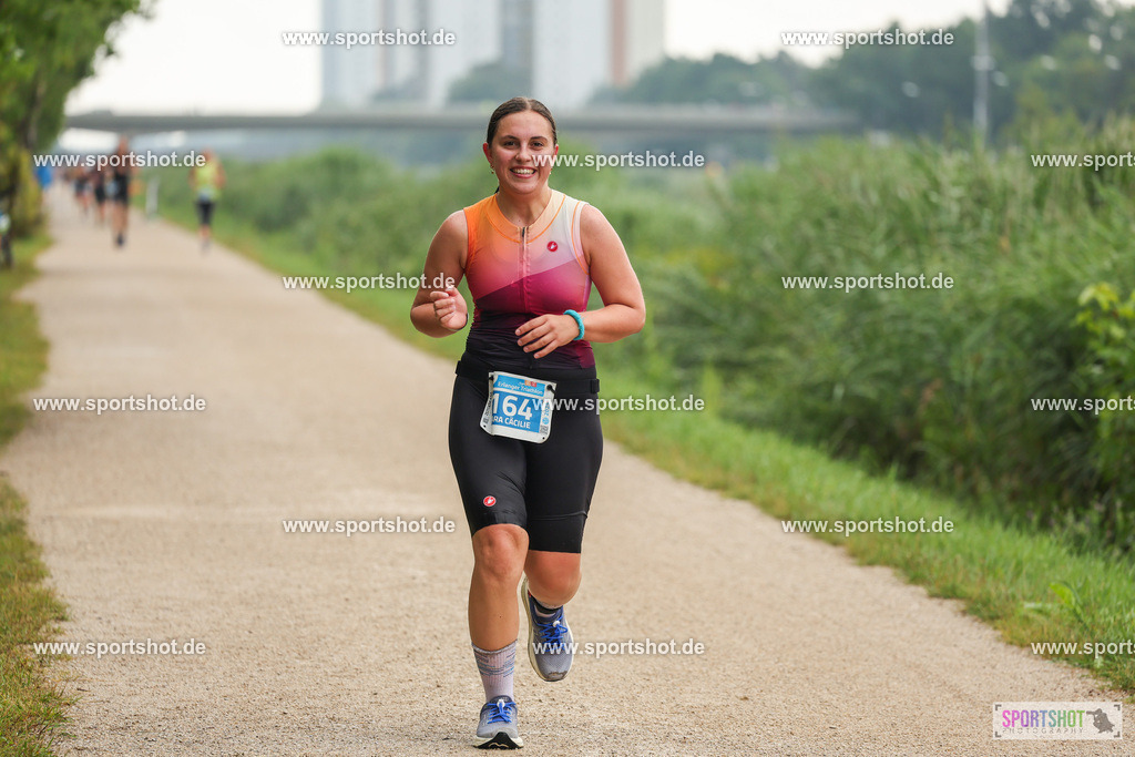 LUR_1844 | 34. M-net Erlanger Triathlon 2025 #erlangertriathlon  #mnettriathlon2025 #mnettriathlon #team #olympischedistanz #mitteldistanz #triathlon #maindonaukanal  #erlangertriathlon2025 #yourpictrs #tv1848 #tv1848erlangen  #triathlonbayern #sportinerlangen #demsportverbunden #sportshot_your_pictrs Copyright: www.sportshot.de