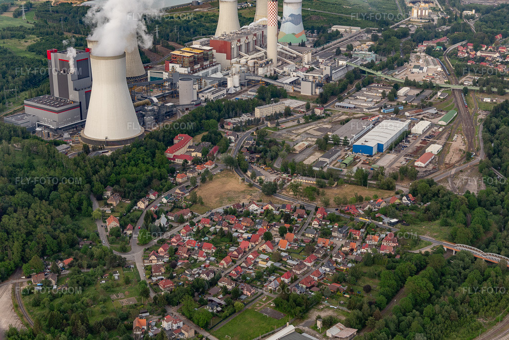 Aerial view: Village at the foot of the brown coal power plant Turów 