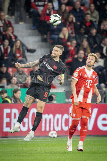 DFB Cup semifinal match Bayer 04 Leverkusen vs. FC Bayern Munich, 22.04.2026 | LEVERKUSEN, GERMANY - APRIL 22, 2026: Robert Andrich (Bayer 04 Leverkusen, 8) , Harry Kane (FC Bayern Muenchen, 8) during the German DFB Cup semifinal match between Bayer 04 Leverkusen vs. FC Bayern Munich at BayArena on April 22, 2026 in Leverkusen, Germany. DFL REGULATIONS PROHIBIT ANY USE OF PHOTOGRAPHS AS IMAGE SEQUENCES AND/OR QUASI-VIDEO.