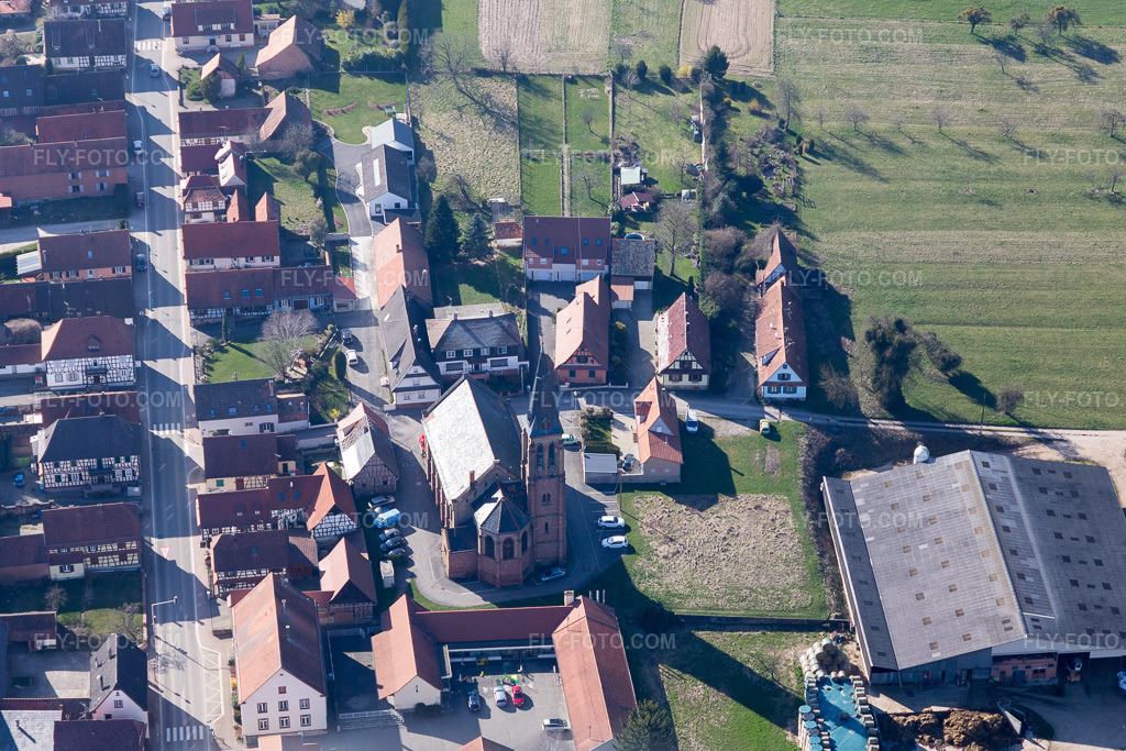 Aerial view: Church building in the village center in Betschdorf in the state Bas-Rhin, France.Photo: IMG_097447.jpg taken on 03/16/2017 by Werner Riehm/FLY-FOTO.comResolution of the original: 5225 x 3483 px