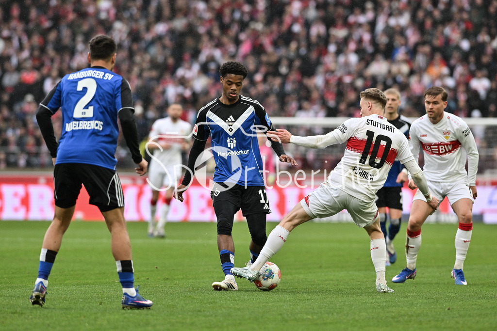 VfB Stuttgart - Hamburger SV | STUTTGART, GERMANY - 12. APRIL: tackle between Warmed OMARI (Hamburger SV 17), Chris FÜHRICH (VfB Stuttgart 10) during the Bundesliga Match between VfB Stuttgart vs. Hamburger SV on Matchday 29 at MHP Arena / DFL REGULATIONS PROHIBIT ANY USE OF PHOTOGRAPHS AS IMAGE SEQUENCES AND/OR QUASI-VIDEO