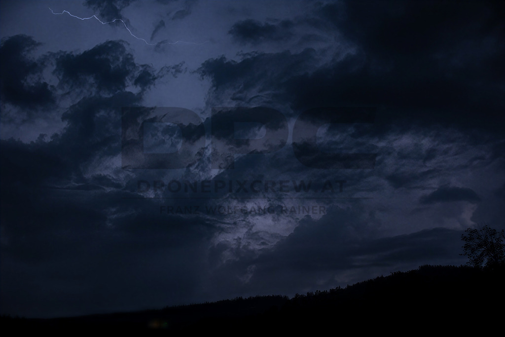 Lightning Storm over the Almenland | Multiple lightning strikes illuminate the night sky over the Almenland region in Austria during a powerful summer thunderstorm. - Realisiert mit Pictrs.com