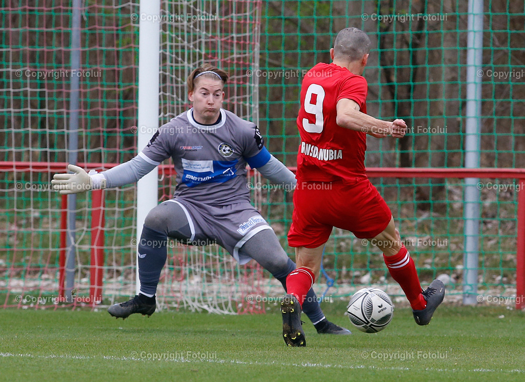 A_LUI_26032023_15 | SPORT,FUSSBALL LL.OST ASKOE OEDT 1B-PUTZLEINSDORF 26.03.2023 IM BILD:RUMEN KEREKOV (OEDT1B)ERZIELT DAS 1:0 UND  FABIAN MAGAUER  (PUTZLEINSDORF) FOTO:FOTOLUI