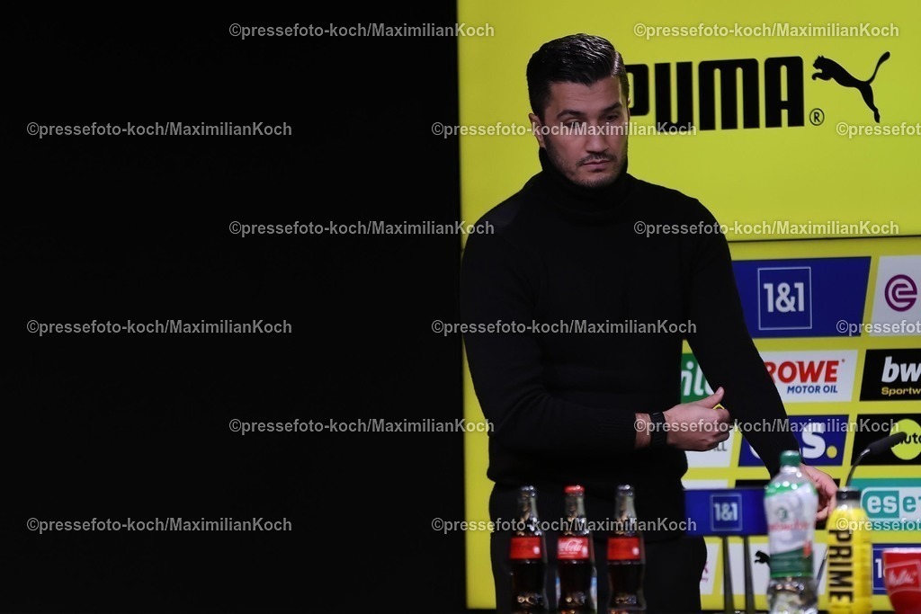 BVB10012501147 | 10.01.2025, Fußball, Borussia Dortmund - Bayer 04 Leverkusen, 1. Fußball Bundesliga, 16. Spieltag, Signal Iduna Park, Saison 2024 2025: Pressekonferenz mit den Trainern nach dem Spiel - Trainer Nuri Sahin (Cheftrainer BVB) betritt die PKDFB regulations prohibit any use of photographs as image sequences and or quasi-video.