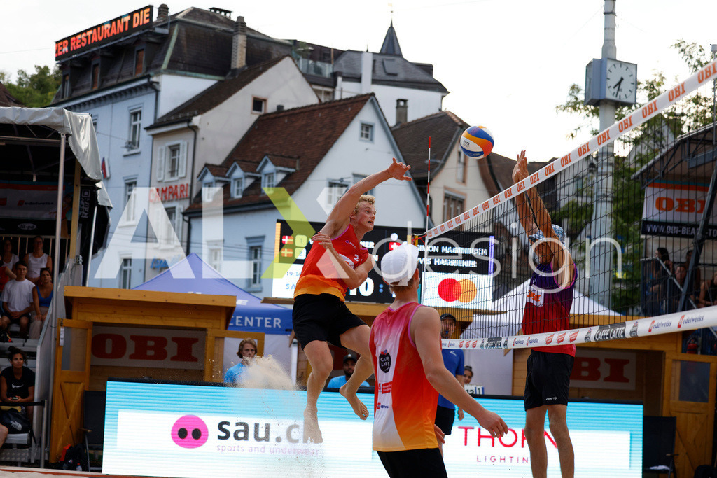 Obi BeachTour 2026 - Basel | BASEL, SWITZERLAND - JULY 18: JACOB HEJLSVIG PETERSEN (DEN) attack / spike during the Obi BeachTour 2026 match between NAPIER / PETERSEN (DEN) and HAGENBUCH / HAUSSENER (SUI) at Barfüsserplatz on July 18, 2026 in Basel, Switzerland. - Realisiert mit Pictrs.com