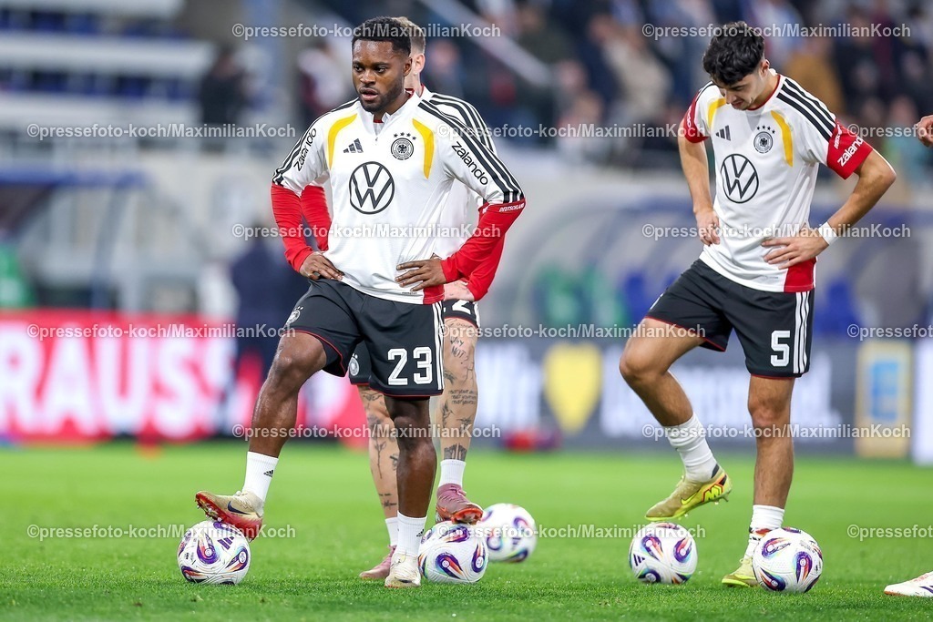 DFB14112501030 | 14.11.2025, Fußball, Länderspiel, WM-Qualifikation Europa, Deutschland - Luxemburg, Stade de Luxembourg (Croix de Gasperich, Luxemburg), 9. Spieltag, Saison 2025 2026: Ridle Baku (GER #23) Aleksandar Pavlovic (GER #05)  Regulations prohibit any use of photographs as image sequences and or quasi-video.