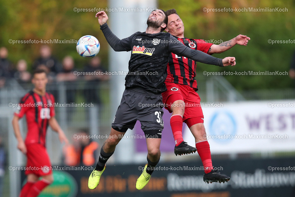 Koe3Liga17042301020 | 17.04.2023, Köln, Fußball, bwin 3. Liga Herren, Sportpark Höhenberg, 32. Spieltag, Saison 2022 2023, FC Viktoria Köln – MSV Duisburg: Marlon Frey von MSV Duisburg kämpft gegen Simon Handle von FC Viktoria Köln um den Kopfball. DFB regulations prohibit any use of photographs as image sequences and or quasi-video.