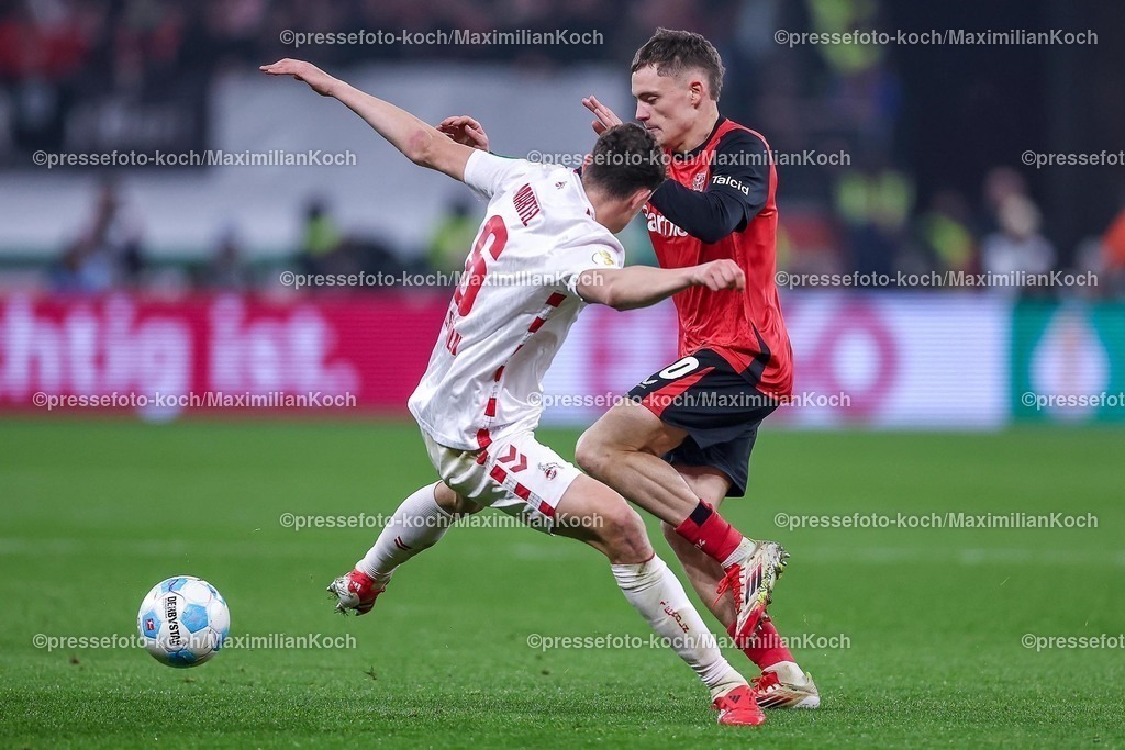 DFB05022502241 | 05.02.2025, Fußball, DFB-Pokal Viertelfinale, Bayer 04 Leverkusen - 1.FC Köln, BayArena, Saison 2024 2025: Eric Martel (FC Köln #6) im Zweikampf gegen Florian Wirtz (Bayer04 Leverkusen #10)DFB regulations prohibit any use of photographs as image sequences and or quasi-video.