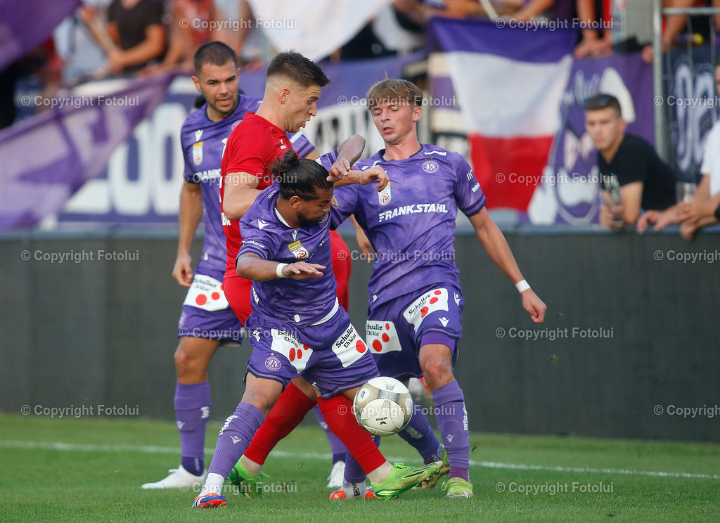 A_LUI_280824_18 | SPORT FUSSBALL UNIQA OEFB CUP 2024 2.RUNDE ASKOE OEDT-WIENER AUSTRIA 28.08.2024 IM BILD: ARNE AMMERER (OEDT) UND HAKIM GUENOUCHE (AUSTRIA) FOTO:FOTOLUI