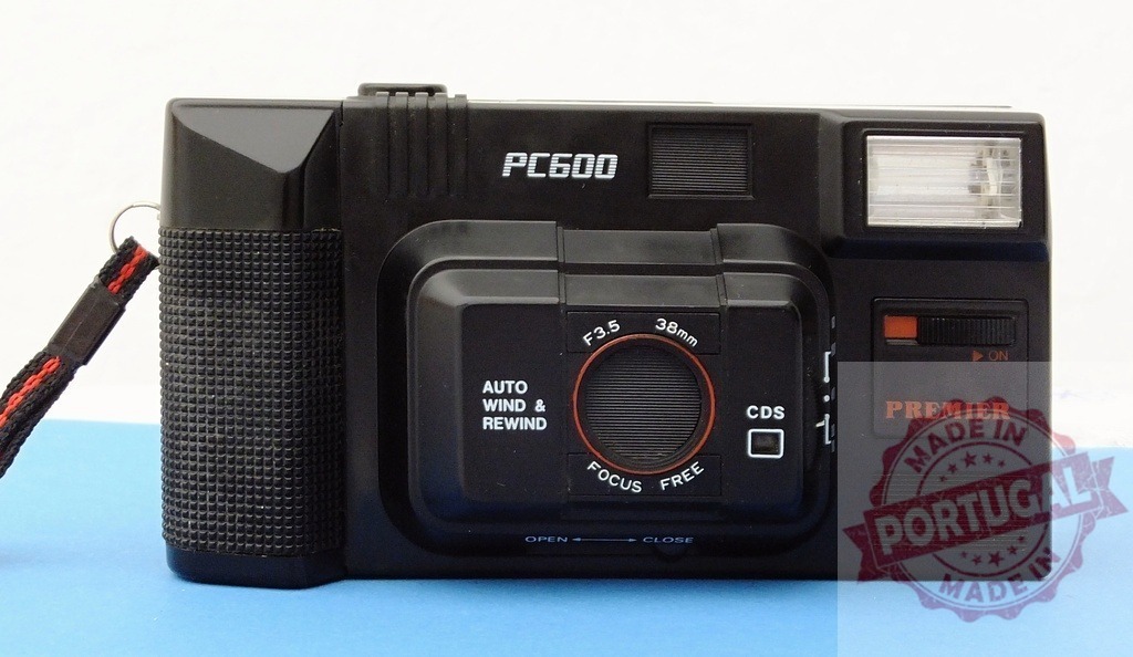 Premier PC600 vintage 35mm film photography camera | Black Premier PC600 point and shoot 35mm film camera for retro lifestyle and technology concepts - Realized with Pictrs.com