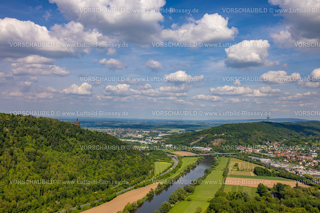 PortaWestfalica240505229Wiehengebirge_Kaiser-Wilhelm-Denkmal | Luftbild, Kaiser-Wilhelm-Denkmal, kulturelles Denkmal, Wiehengebirge und Fluss Weser, Fernsehturm Porta Westfalica, Fernsicht mit blauem Himmel und Wolken, Holzhausen, Porta Westfalica, Ostwestfalen, Nordrhein-Westfalen, Deutschland