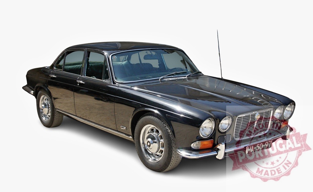 Black Jaguar XJ classic car isolated on white | Black Jaguar XJ luxury saloon vehicle showcasing vintage design and elegant transportation - Realisiert mit Pictrs.com
