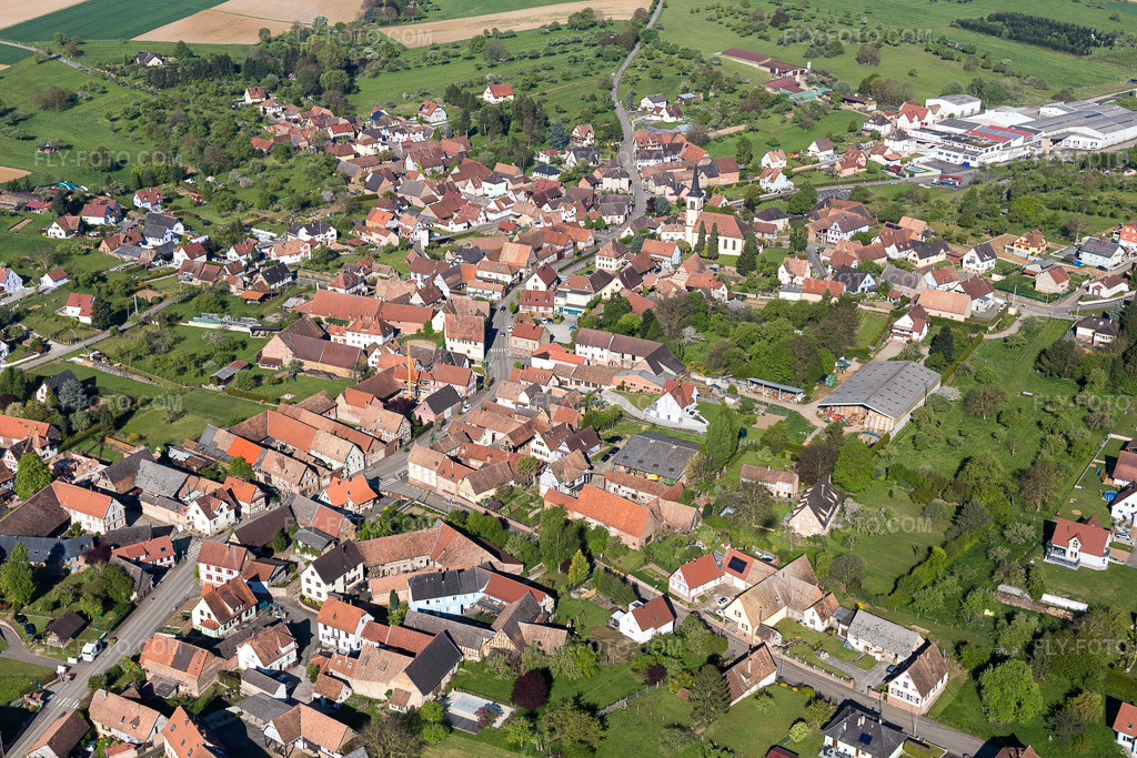 Aerial view: Village view in Mietesheim in the state Bas-Rhin, France. – Photo: IMG_099432.jpg taken on 04/30/2017 by Werner Riehm/FLY-FOTO.com – Resolution of the original: 5472 x 3648 px