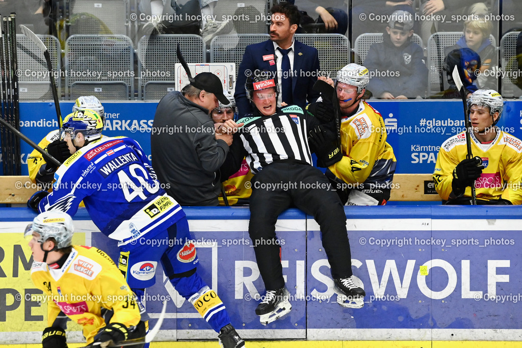 EC IDM WÄRMEPUMPEN VSV vs. Vienna Capitals | Equipment Manager Vienna Capitals Thomas Bardodej, Individualtrainer Vienna Capitals Rafael Rotter, #40 Elias Wallenta EC VSV, RIECKEN SIMON Referee, Referee sturtz auf die Spielerbank, EC IDM WÄRMEPUMPEN VSV vs. Vienna Capitals, EC IDM WÄRMEPUMPEN VSV vs. Vienna Capitals am 16.11.2025 in Villach (Stadthalle Villach), Austria, (Photo by Bernd Stefan)