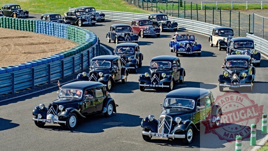 Citroën Traction Avant vintage car rally on racetrack | Classic Citroën Traction Avant cars driving on a circuit during a rally - Realized with Pictrs.com