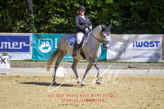 DKP42140 | Turniersportfotografie; Pferdefotografie; Dressurfotografie