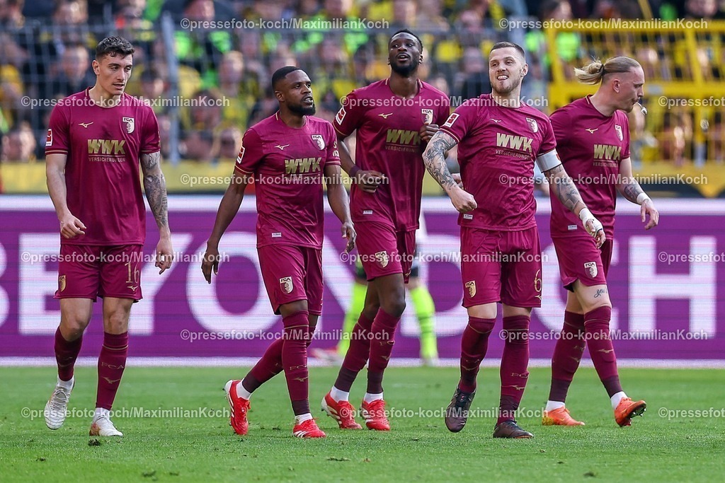 BVB08032502212 | 08.03.2025, Fußball, Borussia Dortmund - FC Augsburg, 1. Fußball Bundesliga, 25. Spieltag, Signal Iduna Park, Saison 2024 2025: Torjubel nach dem 1:0 durch Jeffrey Gouweleeuw (FC Augsburg #6). Zusammen mit Cedric Zesiger (FC Augsburg #16), Frank Onyeka (FC Augsburg #19), Chrislain Matsima (FC Augsburg #5), Marius Wolf (FC Augsburg #11)DFB regulations prohibit any use of photographs as image sequences and or quasi-video.