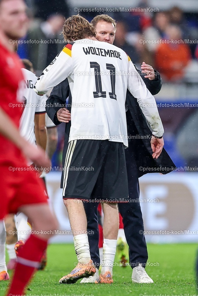 DFB14112501165 | 14.11.2025, Fußball, Länderspiel, WM-Qualifikation Europa, Deutschland - Luxemburg, Stade de Luxembourg (Croix de Gasperich, Luxemburg), 9. Spieltag, Saison 2025 2026: Nationaltrainer Julian Nagelsmann (GER #hc) zusammen mit Nick Woltemade (GER #11) Umarmung  Regulations prohibit any use of photographs as image sequences and or quasi-video.