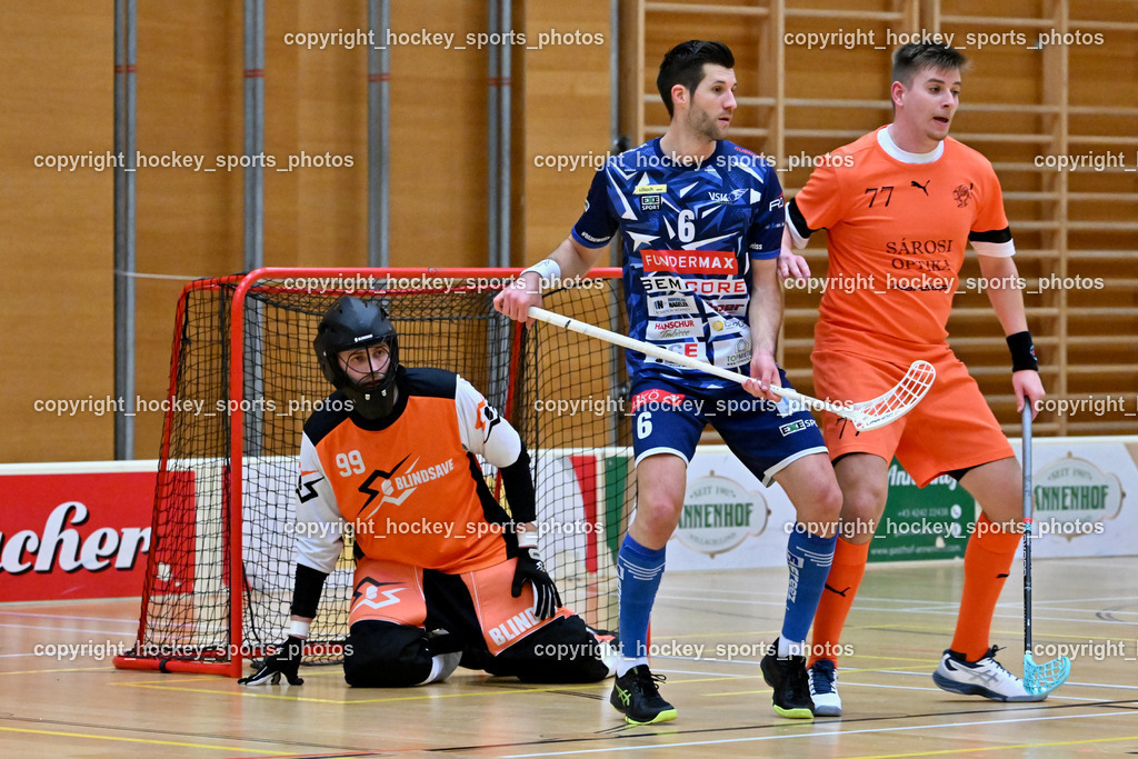 VSV Unihockey vs. SZPK Floorball | #99 Zoltán Szuri SZPK SÁROSI OPTIKA KOMÁROM, #6 Timo Schmid VSV Unihockey, #77 Bence Dávid SZPK SÁROSI OPTIKA KOMÁROM, VSV Unihockey vs. SZPK Floorball, VSV Unihockey vs. SZPK Floorball am 23.11.2024 in Villach (Ballspielhalle St. Martin), Austria, (Photo by Bernd Stefan)