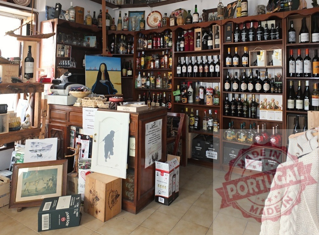 Liquor store interior displaying wine spirits bottles on shelves | Liquor store interior showing assorted bottles of wine, spirits, and alcohol on rustic wooden shelves - Realized with Pictrs.com