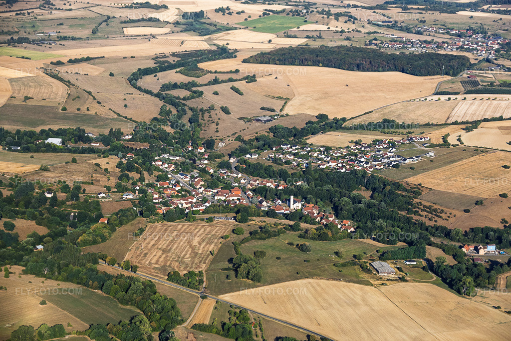 Aerial view: View of the town from the east in Volmunster in the state Moselle, France. – Photo: IMG_158570.jpg taken on 08/14/2026 by Werner Riehm/FLY-FOTO.com – Resolution of the original: 6000 x 4000 px