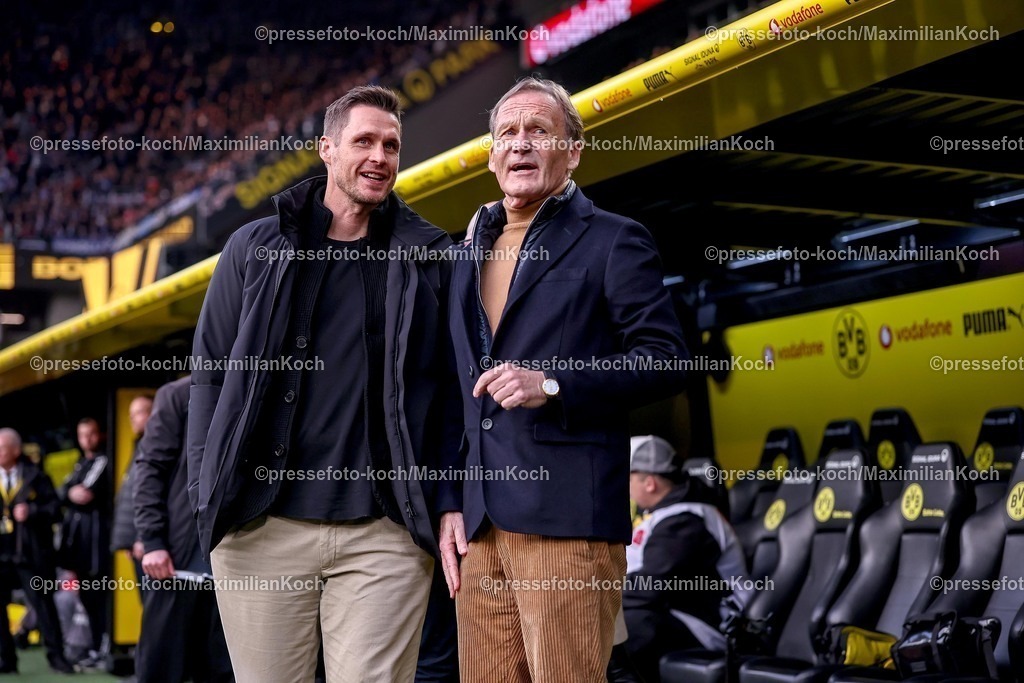 BVB21032602088 | 21.03.2026, Fußball, Borussia Dortmund - Hamburger SV, 1. Fußball Bundesliga, 27. Spieltag, Signal Iduna Park, Saison 2025 2026: Sportdirektor Sebastian Kehl (BVB #sk) zusammen mit neben Präsident Hans-Joachim Watzke (BVB #jw)  DFB regulations prohibit any use of photographs as image sequences and or quasi-video.