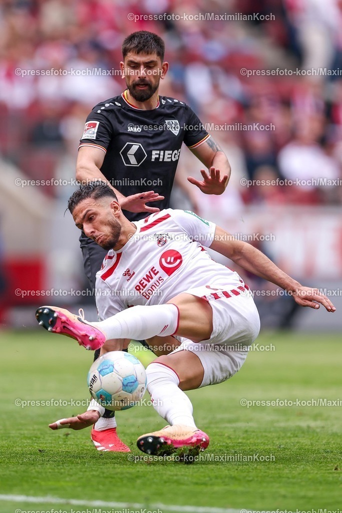 1FC20042501163 | 20.04.2025, Fußball, 1. FC Köln - Preußen Münster, 2.. Fußball Bundesliga, 30. Spieltag, RheinEnergie-STADION, Saison 2024 2025: Malik Batmaz (Preussen Muenster #23) im Zweikampf gegen Dejan Ljubicic (FC Koeln #7) DFB regulations prohibit any use of photographs as image sequences and or quasi-video.