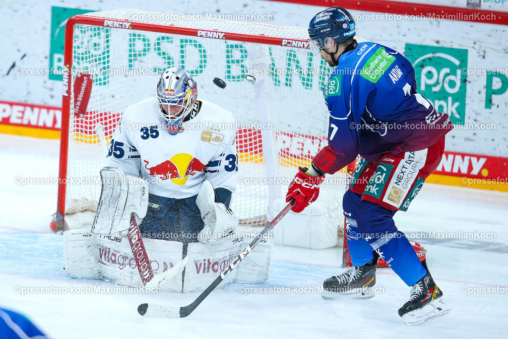 DueDEL17022401024 | 17.02.2024, Düsseldorf, Eishockey, Penny DEL, 47. Spieltag, PSD-BANK Dome, Düsseldorfer EG - EHC Red Bull München: Torhüter Mathias Niederberger (EHC Red Bull München) verteidigt das Tor gegen Sinan Akdag (Düsseldorfer EG)
