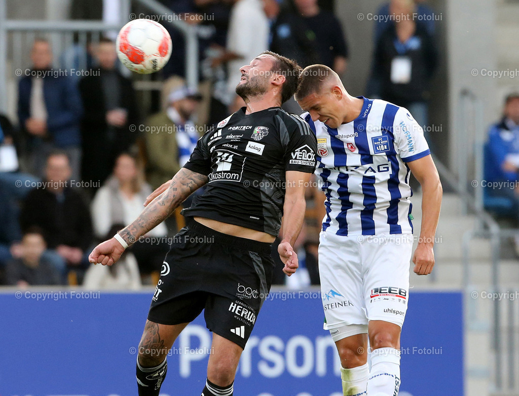 A_LUI_191024_06 | SPORT,FUSSBALL,ADMIRAL BUNDESLIGA BLAU WEISS LINZ-RZ PELLETS WAC 19.10.2024 IM BILD MARTIN MOORMANN (BL.WEISSLINZ) UND MARKUS PINK (WAC) FOTOLUI/MW